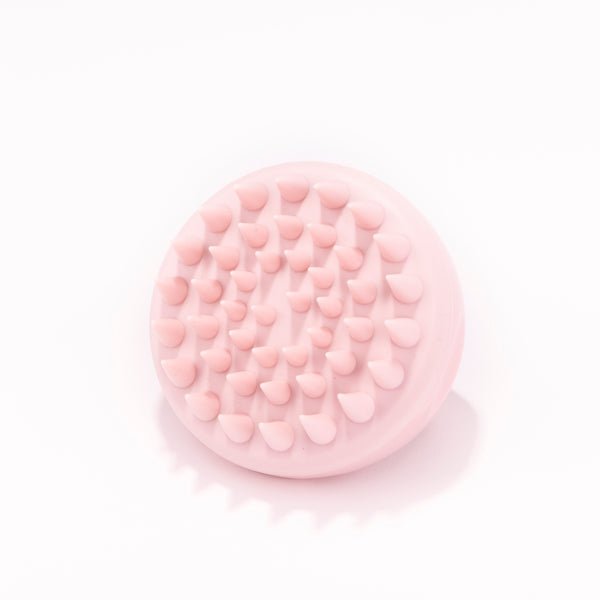 Brosse massante cuir chevelu